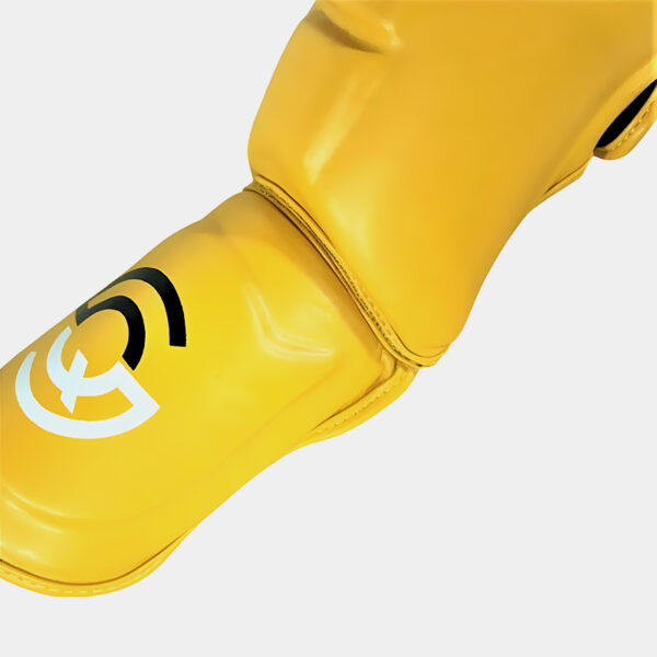Protector Tibial - QST Élite (Amarillo)